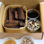 The Brownie Box UK Postal Brownie Dipping Box Posted Nationwide. Contains Brownies, Dipping Sauces & Chocolate Crumb.