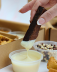 The Brownie Box UK Postal Brownie Dipping Box Posted Nationwide. Contains Brownies, Dipping Sauces & Chocolate Crumb.